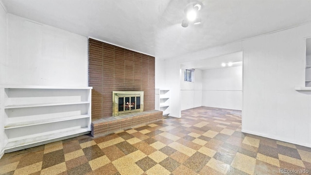 unfurnished living room featuring a fireplace