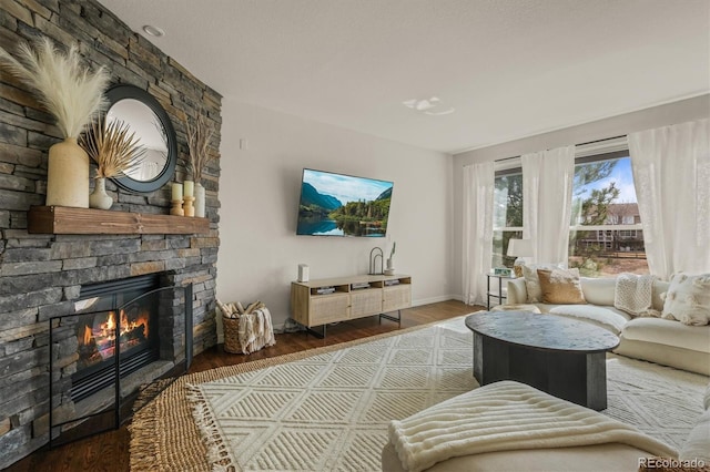 854 Countrybriar Ln, Highlands Ranch, CO 80129 - living area with a fireplace and wood finished floors