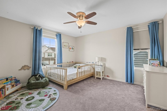 854 Countrybriar Ln, Highlands Ranch, CO 80129 - carpeted bedroom with a crib and ceiling fan