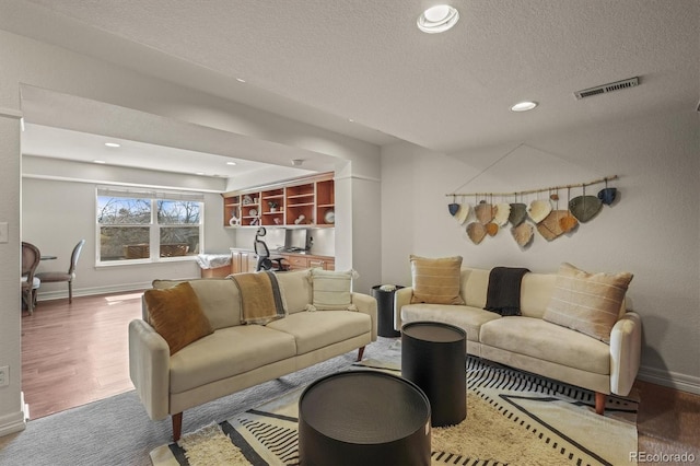 854 Countrybriar Ln, Highlands Ranch, CO 80129 - living room featuring a textured ceiling and recessed lighting