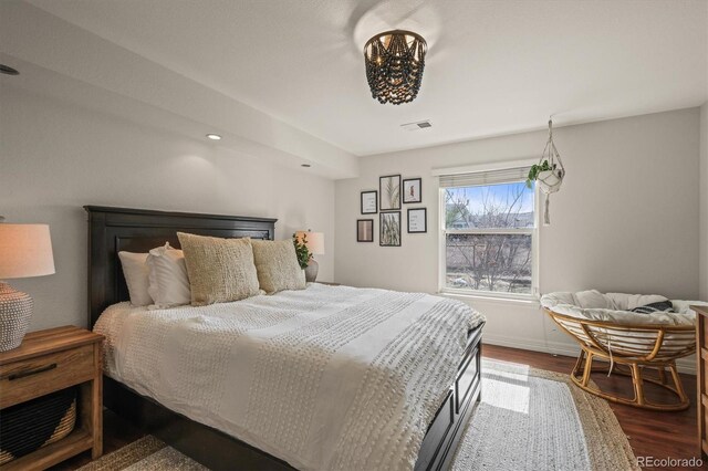 854 Countrybriar Ln, Highlands Ranch, CO 80129 - bedroom with dark wood finished floors and baseboards