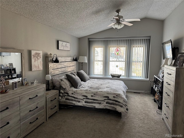 carpeted bedroom featuring lofted ceiling, a ceiling fan, and a textured ceiling