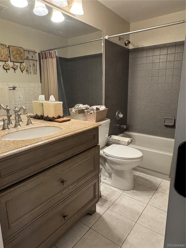 full bath featuring tile patterned flooring, shower / tub combo with curtain, vanity, and toilet