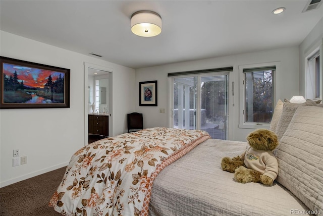 carpeted bedroom with access to outside and ensuite bath