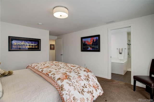 carpeted bedroom featuring ensuite bathroom