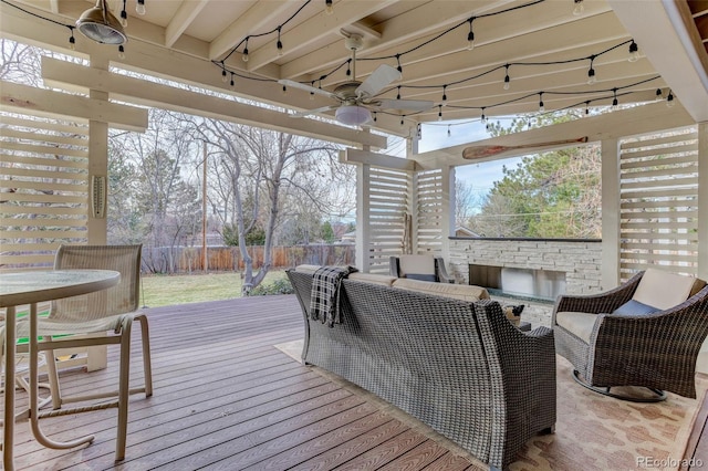 wooden deck with ceiling fan