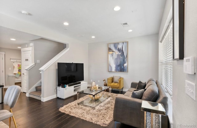 11255 E 25th Ave, Aurora, CO 80010 - living area featuring dark wood-style flooring, stairs, visible vents, and recessed lighting