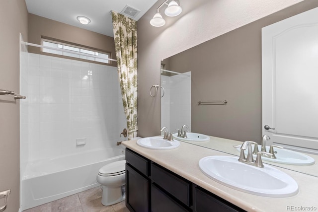 17223 W 84th Dr, Arvada, CO 80007 - bathroom featuring toilet, shower / washtub combination, and double vanity