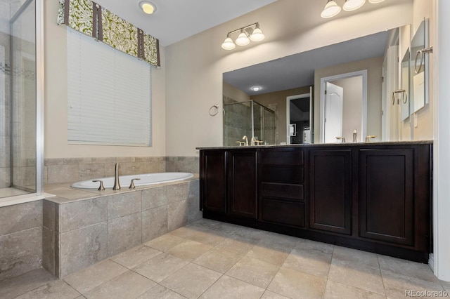 17223 W 84th Dr, Arvada, CO 80007 - full bathroom with a stall shower, a garden tub, and double vanity
