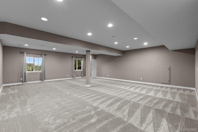 17223 W 84th Dr, Arvada, CO 80007 - below grade area with light colored carpet, baseboards, and recessed lighting