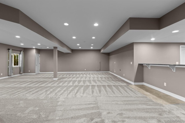 17223 W 84th Dr, Arvada, CO 80007 - below grade area featuring light colored carpet, baseboards, and recessed lighting