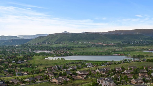17223 W 84th Dr, Arvada, CO 80007 - view of mountain backdrop featuring a nearby body of water and nearby suburban area