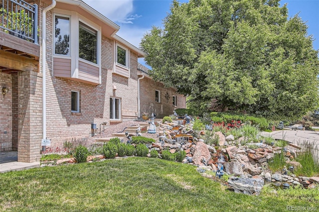 7769 W 70th Dr, Arvada, CO 80004 - view of green lawn