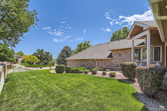 7769 W 70th Dr, Arvada, CO 80004 - view of green lawn
