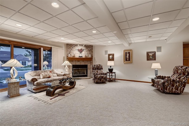 7769 W 70th Dr, Arvada, CO 80004 - living area featuring carpet, a brick fireplace, and recessed lighting