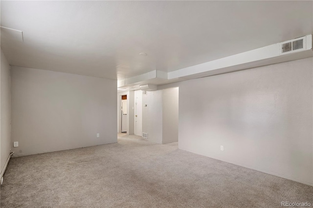 empty room featuring carpet flooring