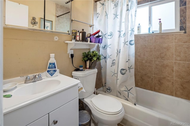 full bathroom with shower / bath combination with curtain, toilet, and vanity