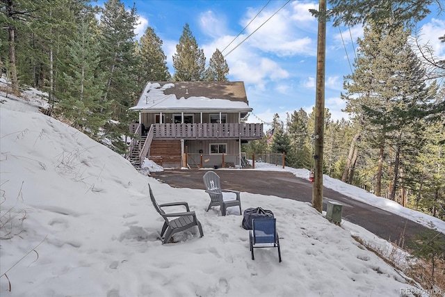 view of snow covered property