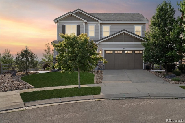 3741 Harvard Pl, Broomfield, CO 80023 - craftsman house with a lawn, driveway, a garage, and stone siding