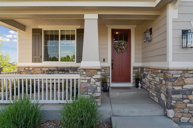 3741 Harvard Pl, Broomfield, CO 80023 - property entrance featuring stone siding and covered porch