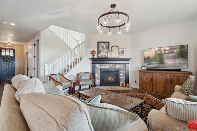 3741 Harvard Pl, Broomfield, CO 80023 - living room with stairs, a fireplace, wood finished floors, and recessed lighting