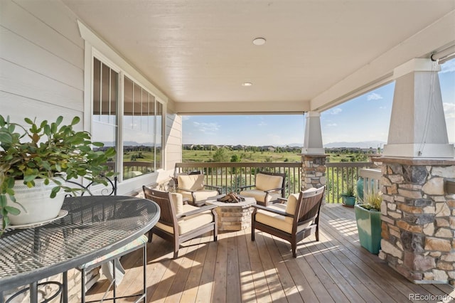 3741 Harvard Pl, Broomfield, CO 80023 - wooden terrace featuring an outdoor fire pit