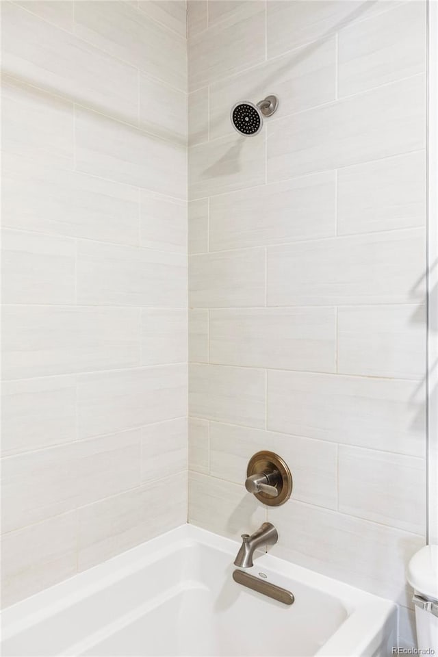 6580 Independence Way, Arvada, CO 80004 - full bath featuring  shower combination and toilet