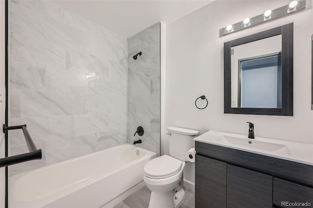 full bathroom featuring vanity, toilet, and tiled shower / bath combo