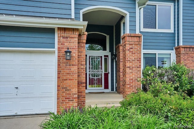 19113 W 60th Ln, Golden, CO 80403 - doorway to property with brick siding