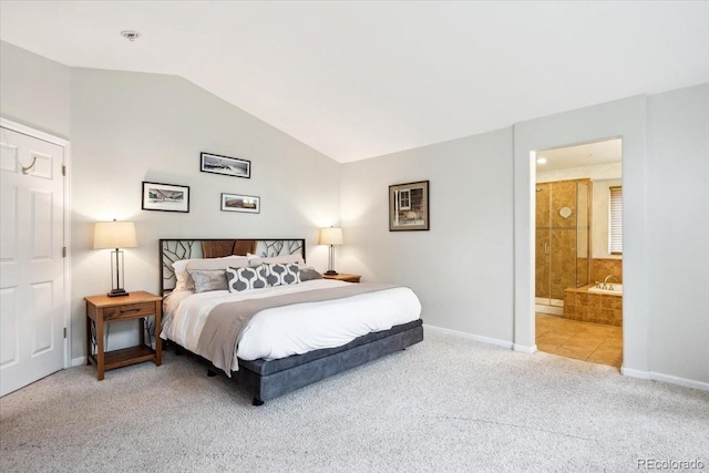 19113 W 60th Ln, Golden, CO 80403 - carpeted bedroom featuring vaulted ceiling and connected bathroom