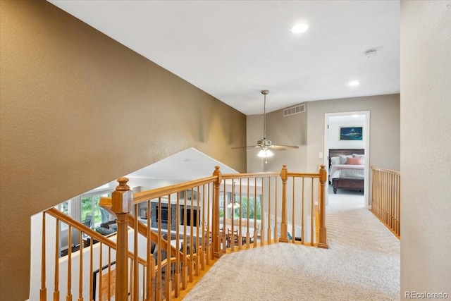 19113 W 60th Ln, Golden, CO 80403 - corridor with carpet flooring, an upstairs landing, recessed lighting, and a textured wall