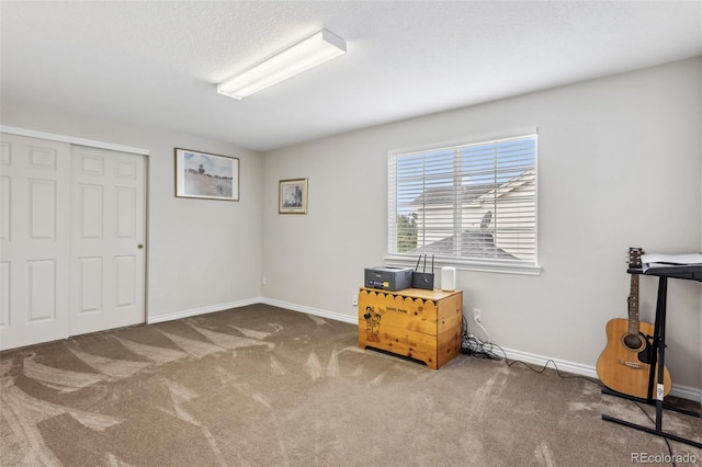 17391 E Weaver Ave, Aurora, CO 80016 - bedroom with carpet floors, baseboards, and a closet