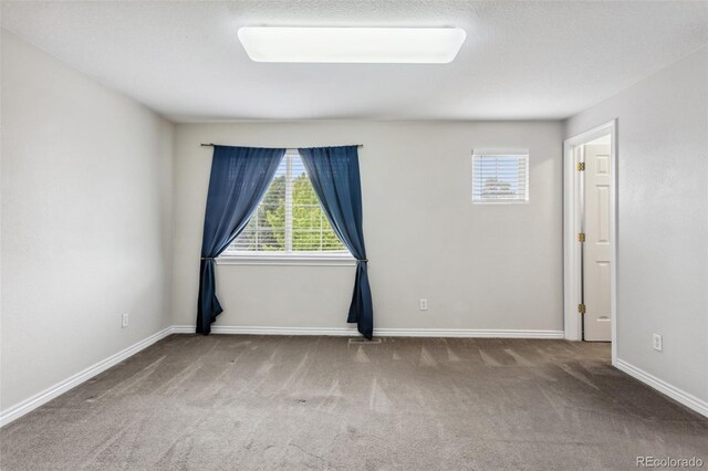 17391 E Weaver Ave, Aurora, CO 80016 - carpeted spare room featuring plenty of natural light and baseboards