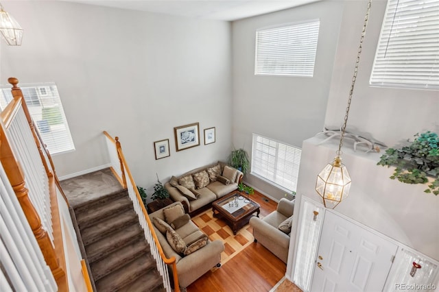 17391 E Weaver Ave, Aurora, CO 80016 - living room featuring plenty of natural light and wood finished floors