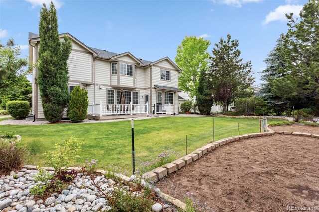 17391 E Weaver Ave, Aurora, CO 80016 - back of property with a yard