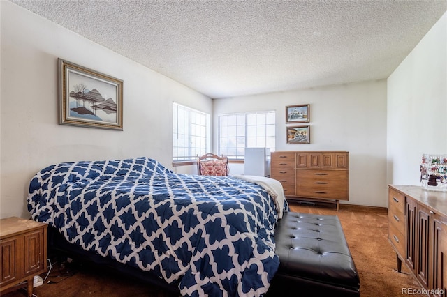 750 S Dearborn Ct, Aurora, CO 80012 - carpeted bedroom featuring a textured ceiling