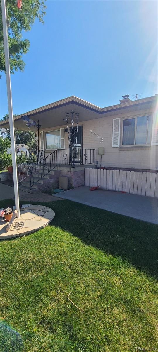 5423 Pecos St, Denver, CO 80221 - view of front of home with a front yard