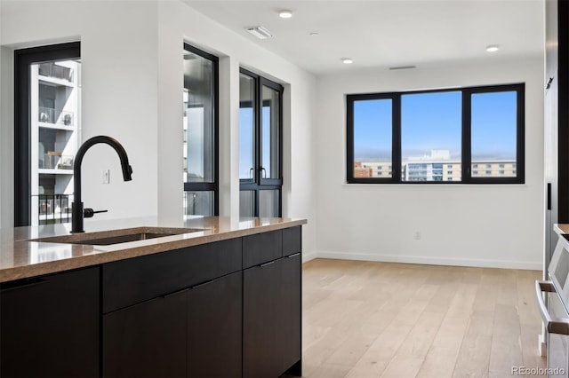 kitchen featuring sink and light hardwood / wood-style floors