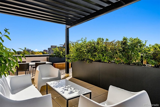 view of patio featuring an outdoor living space and a pergola