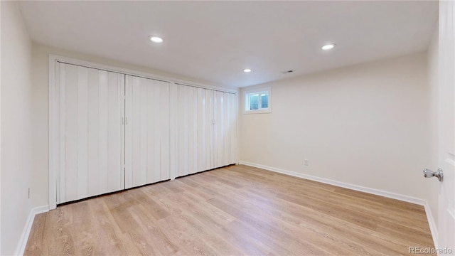 unfurnished bedroom with light hardwood / wood-style floors