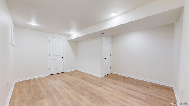 basement with light wood-type flooring