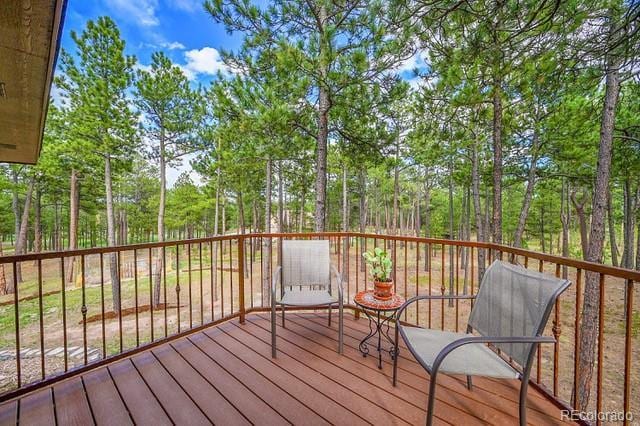 15947 Huckleberry Hts, Colorado Springs, CO 80908 - view of wooden deck