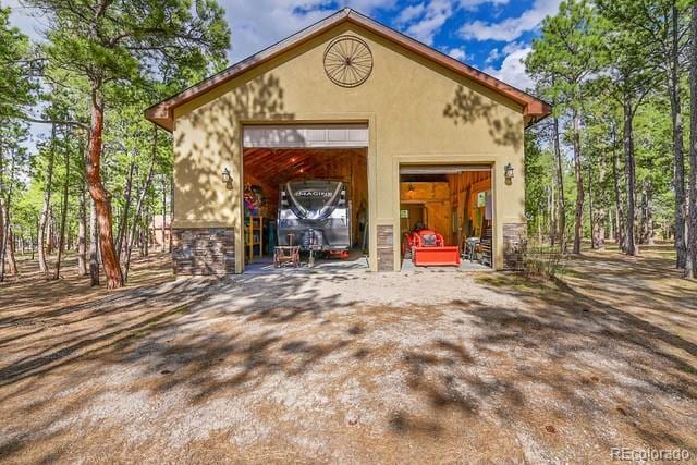 15947 Huckleberry Hts, Colorado Springs, CO 80908 - exterior space with an outdoor structure