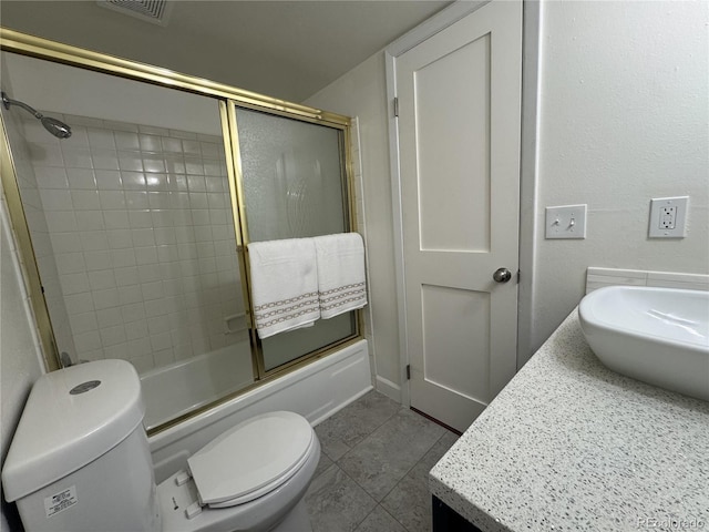 12166 Melody Dr Unit 202, Denver, CO 80234 - full bath with enclosed tub / shower combo, vanity, and tile patterned floors