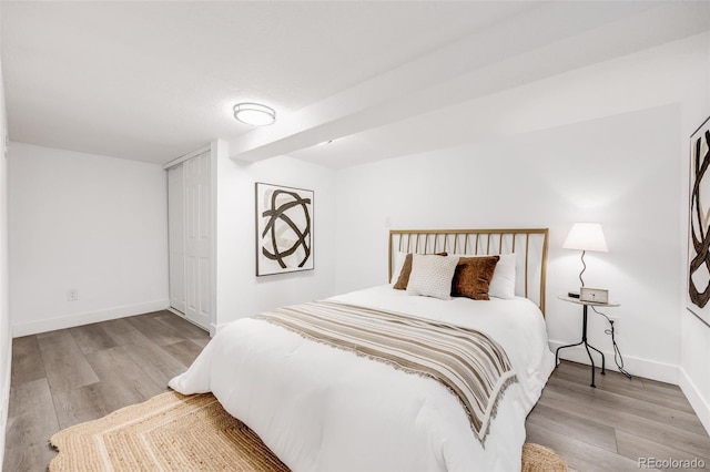 3249 W Alaska Pl, Denver, CO 80219 - bedroom with wood finished floors and baseboards