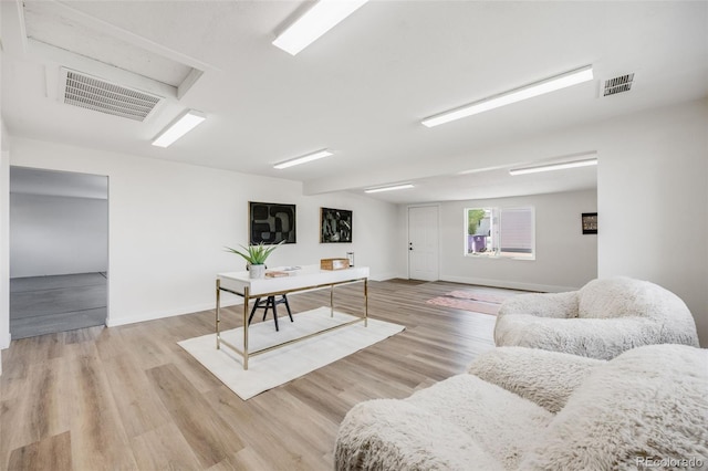 3249 W Alaska Pl, Denver, CO 80219 - living area with visible vents, wood finished floors, and baseboards