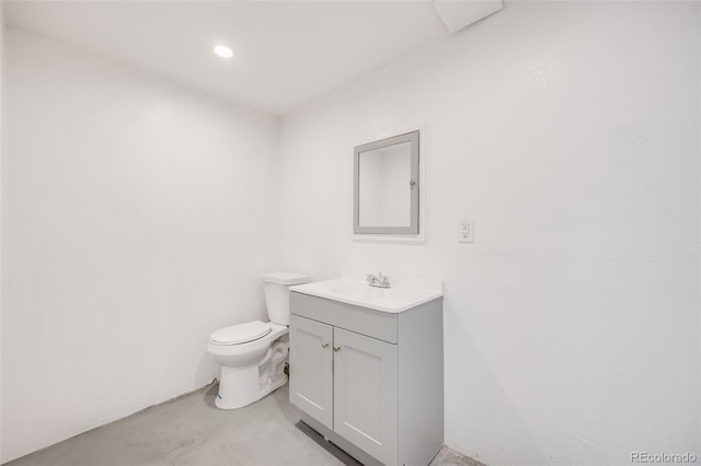 3249 W Alaska Pl, Denver, CO 80219 - half bath featuring vanity, toilet, and recessed lighting