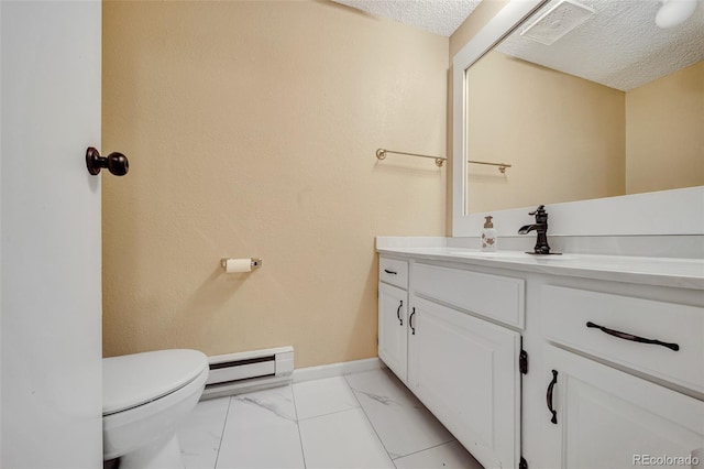 435 Dahlia St, Fort Morgan, CO 80701 - half bathroom with vanity, marble finish flooring, a textured ceiling, and baseboard heating