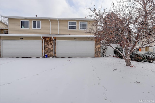 view of front of property featuring a garage