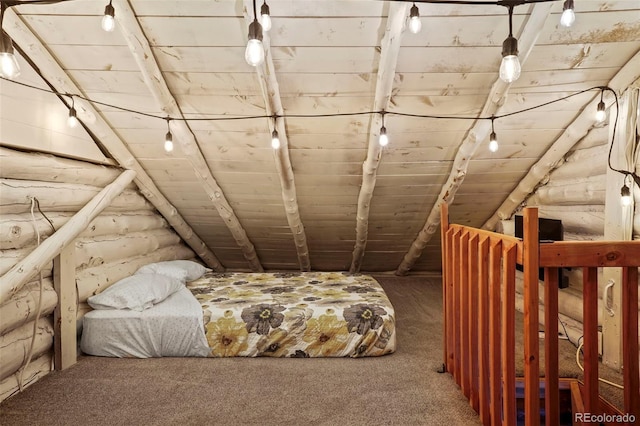 unfurnished bedroom with carpet and vaulted ceiling